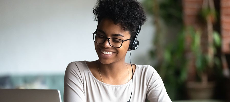 young woman listening with headphones